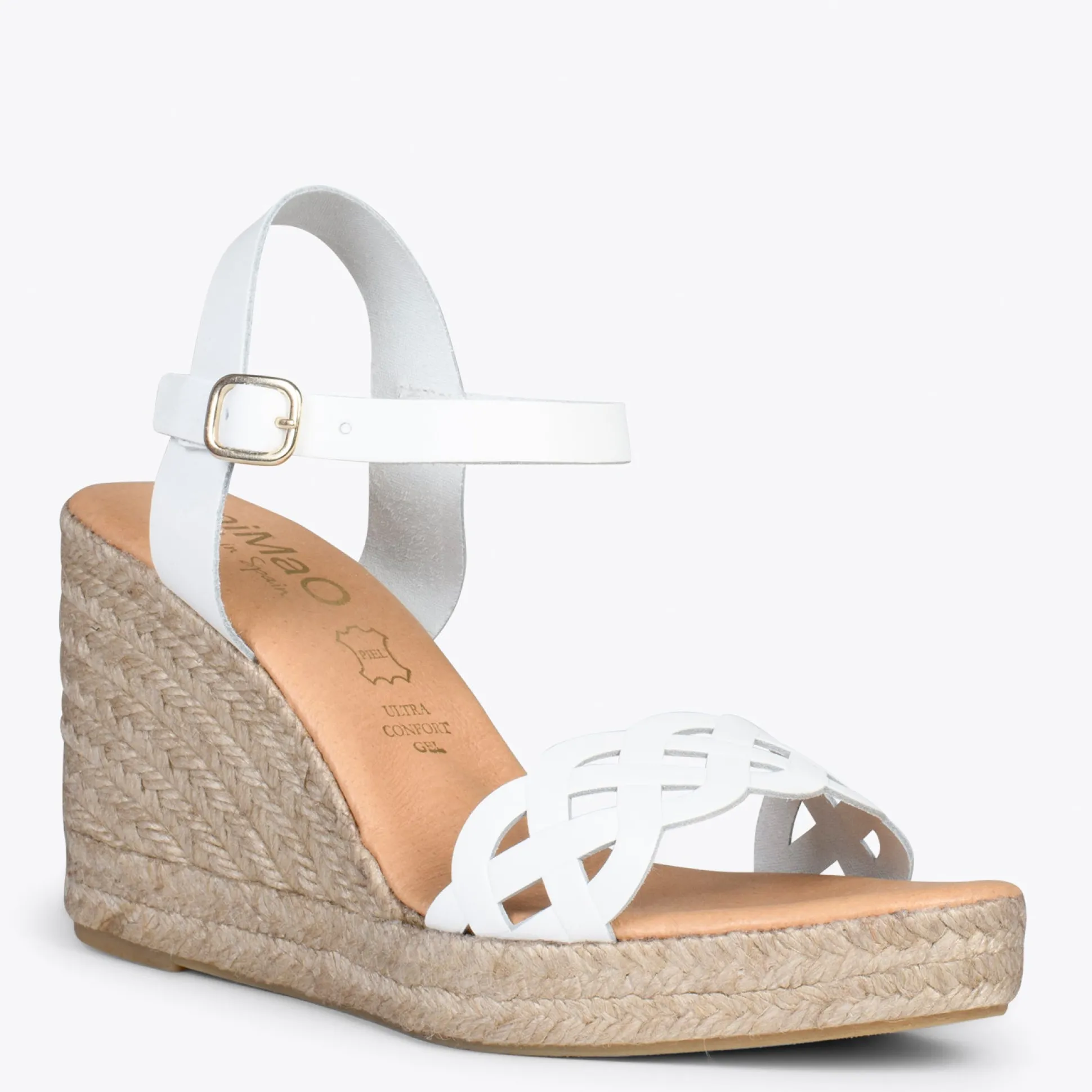 oasis__cunas_de_esparto_t_1.webp Esparto Y Alpargatas<miMaO Oasis – Cunas De Esparto Tostado Con Trenza Blanco