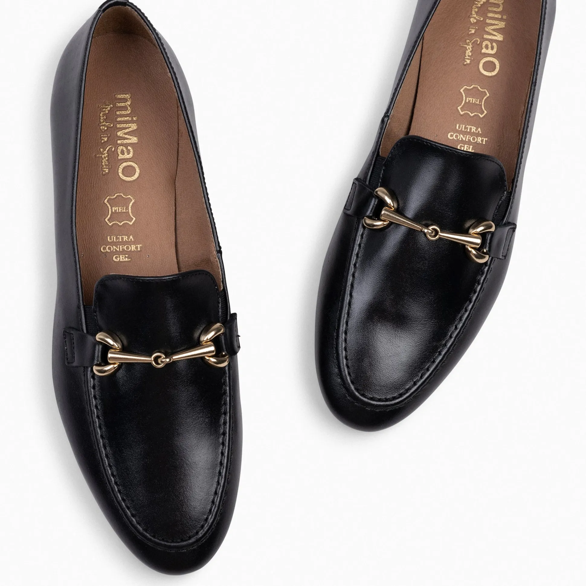 style__mocasines_con_deta_2-1.webp Mocasines Y Blucher<miMaO Style - Mocasines Con Detalle Metalizado Negro